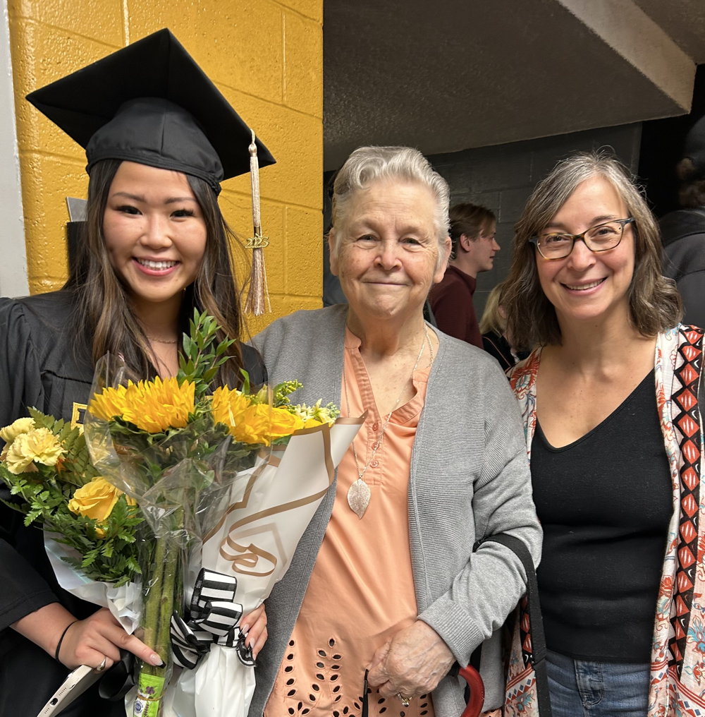 photo of Nancy attending her granddaughter's college graduation